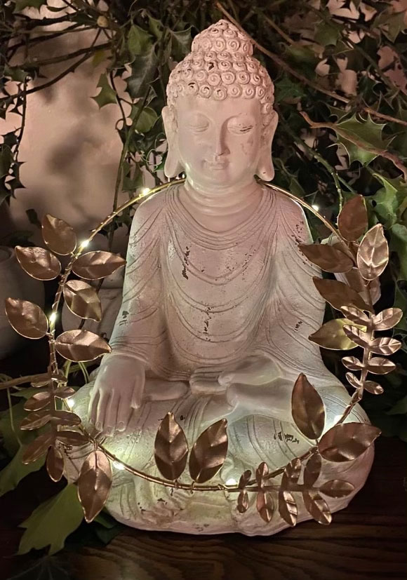 buddha with candle